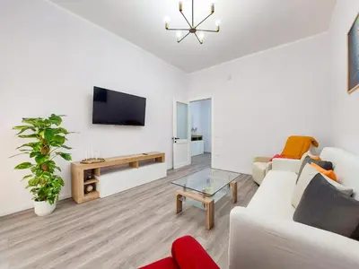 TV o dispositivi per l'intrattenimento presso Guest House - Vivamus Large and Elegant apartment