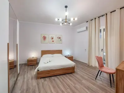 Letto o letti in una camera di Guest House - Vivamus Large and Elegant apartment