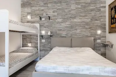 Letto o letti in una camera di Domu de Mari- Free Beach Residence