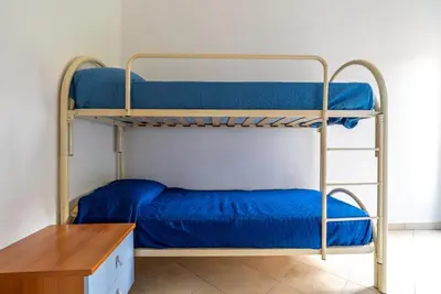 Letto o letti in una camera di Appartamento da Bruna