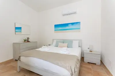 Letto o letti in una camera di Costa Ovest Apartment 2
