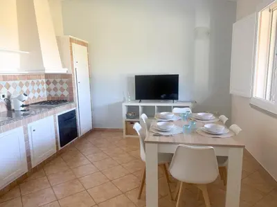 Cucina o angolo cottura di Casa Boeri - Vista mare con piscina e giardino Residence Abba Urci