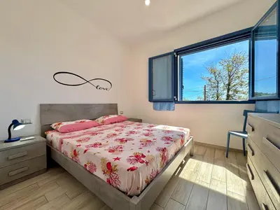 Letto o letti in una camera di Sea View Terrace