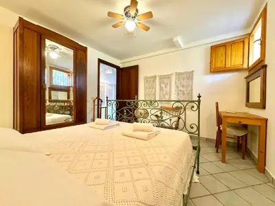 Letto o letti in una camera di Colori di Sardegna Apartments