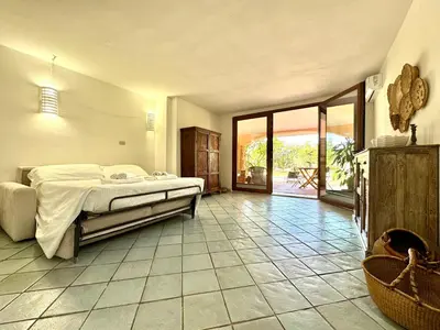 Letto o letti in una camera di Colori di Sardegna Apartments