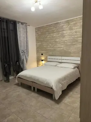 Letto o letti in una camera di Altro Cielo
