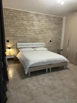 Letto o letti in una camera di Altro Cielo
