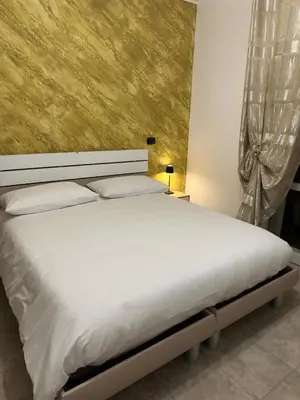 Letto o letti in una camera di Altro Cielo