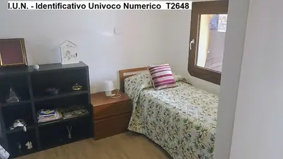 Letto o letti in una camera di Alma House