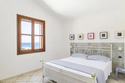 Letto o letti in una camera di Alisei Villa vista mare