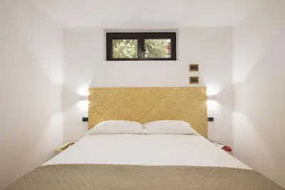 Letto o letti in una camera di Alisei Villa vista mare