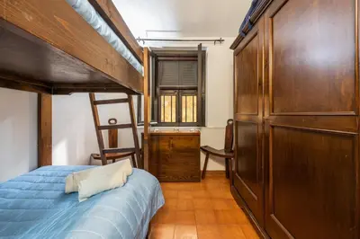 Letto o letti in una camera di Villa Laura