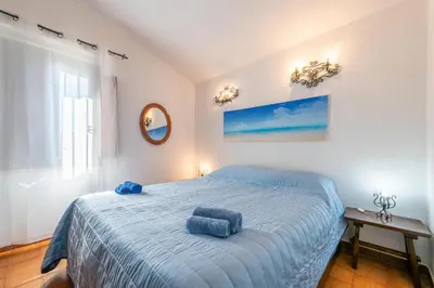 Letto o letti in una camera di Villa Laura