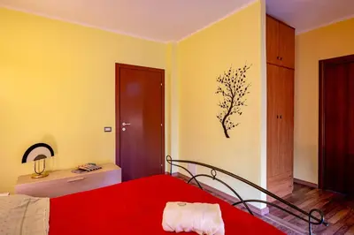 Letto o letti in una camera di Holos Apartment