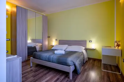 Letto o letti in una camera di Holos Apartment
