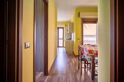 Area soggiorno di Holos Apartment