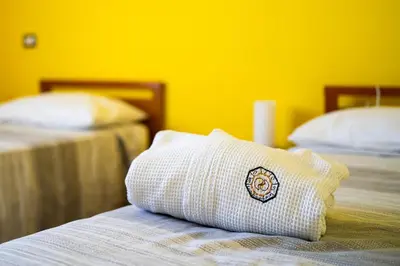 Letto o letti in una camera di Holos Apartment