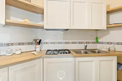 Cucina o angolo cottura di Pine & Sea Hideaway