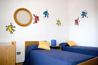 Letto o letti in una camera di Is Cogas