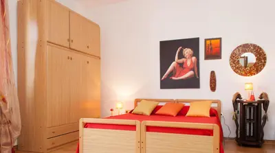 Letto o letti in una camera di Is Cogas