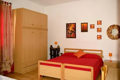 Letto o letti in una camera di Is Cogas