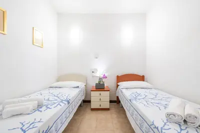 Letto o letti in una camera di Villetta Sea-Mary Costa Rey