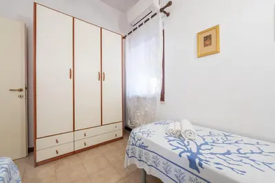 Letto o letti in una camera di Villetta Sea-Mary Costa Rey