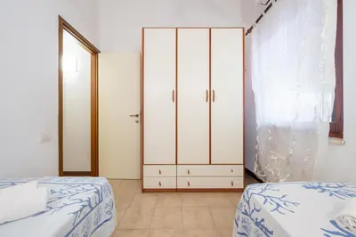 Letto o letti in una camera di Villetta Sea-Mary Costa Rey