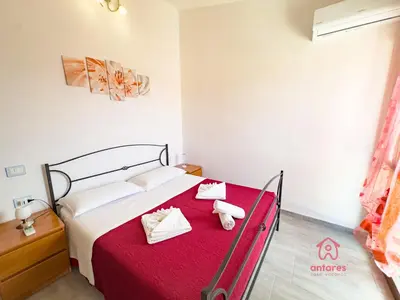 Letto o letti in una camera di Maison Giselle, piscina e mare