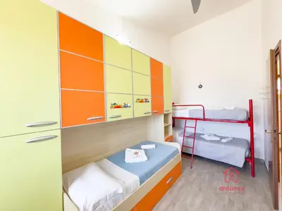 Letto o letti in una camera di Maison Giselle, piscina e mare