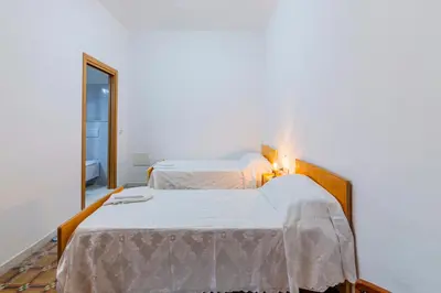Letto o letti in una camera di beb san Nicola