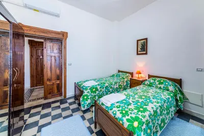 Letto o letti in una camera di beb san Nicola