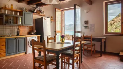 Cucina o angolo cottura di La Terrazza sul Mare - Portopaglia