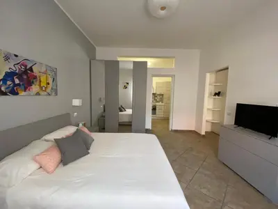 Letto o letti in una camera di Donna Merla