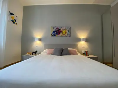 Letto o letti in una camera di Donna Merla