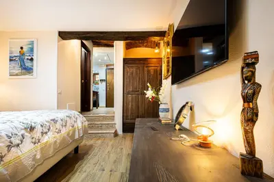 Letto o letti in una camera di Vintage Suite