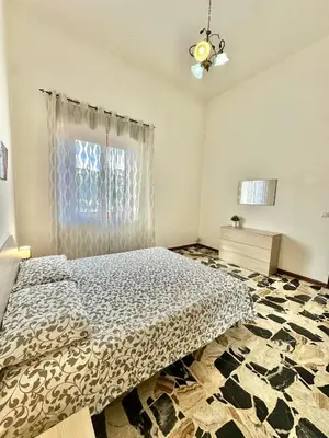 Letto o letti in una camera di Casa Giulia