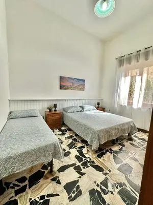 Letto o letti in una camera di Casa Giulia