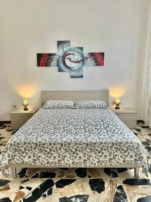 Letto o letti in una camera di Casa Giulia