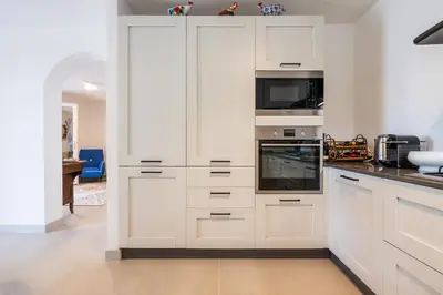 Cucina o angolo cottura di Villa Punta delle Oche by CFSuites