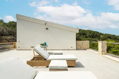 Balcone o terrazza di Villa Punta delle Oche by CFSuites