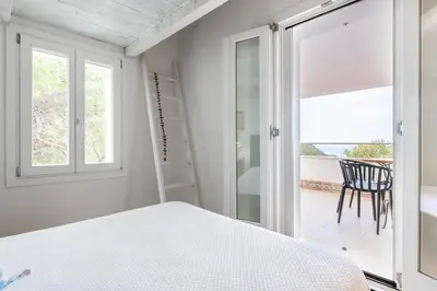 Letto o letti in una camera di Villa Punta delle Oche by CFSuites