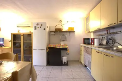 Cucina o angolo cottura di GuestHost - Sonja's Home Dolianova