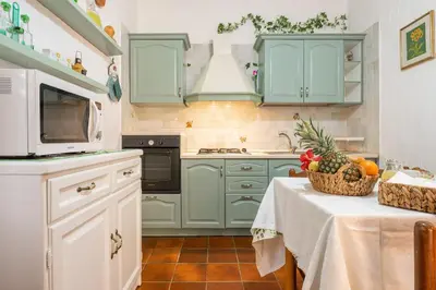 Cucina o angolo cottura di Villa Fedes Sant Elmo