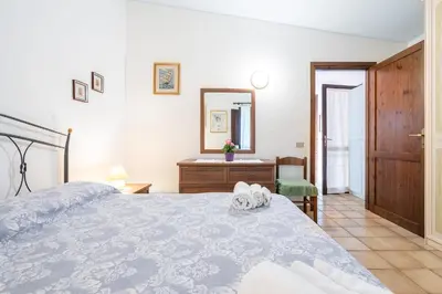 Letto o letti in una camera di Villa Fedes Sant Elmo