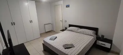 Letto o letti in una camera di Porzione di villetta a Capitana