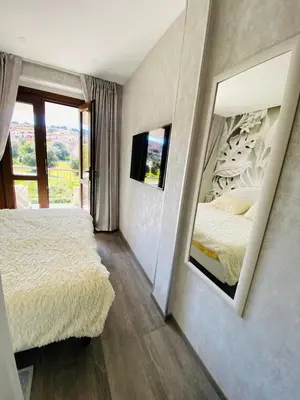 Letto o letti in una camera di Hope House