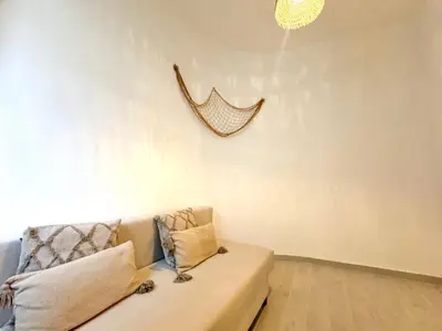 Area soggiorno di Kalma Lux - Sant Efisio Lofts