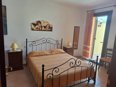 Letto o letti in una camera di Villa Stefania