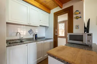 Cucina o angolo cottura di Super-equipped modern apartment - 700 meters from the sea